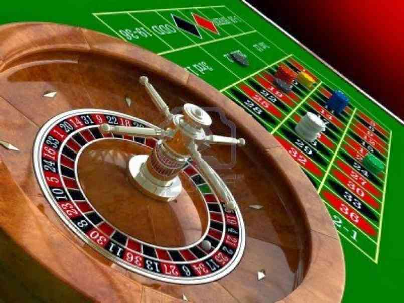 Cận cảnh bàn quay roulette và bảng chứa các ô số để người chơi chọn lựa